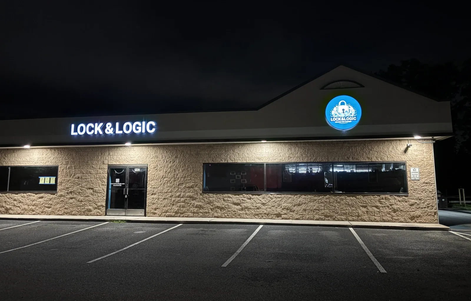 Lock & Logic escape room building entrance at night