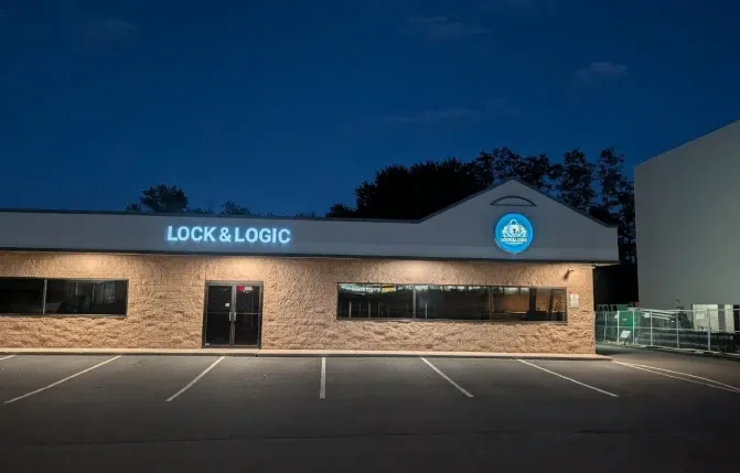 Lock & Logic escape room building entrance at night